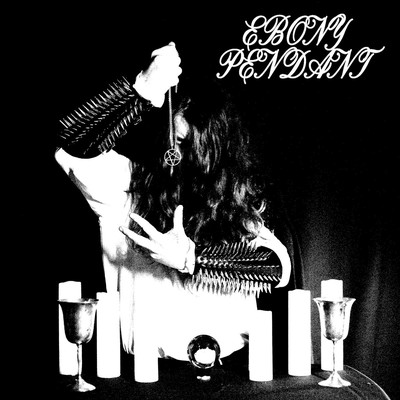 Cover art for Ebony Pendant's self-titled 2023 album: a black-and-white ritual photo of a robed figure with a spiked bone gauntlet holding a pentagram pendant.